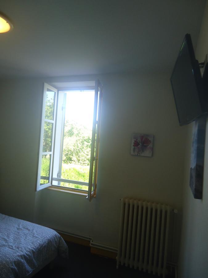 Logis Hotel Du Champ De Foire Saint-Aulaye-Puymangou Exteriör bild